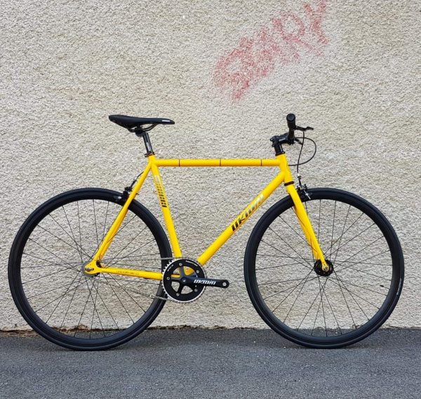 yellow single speed bike